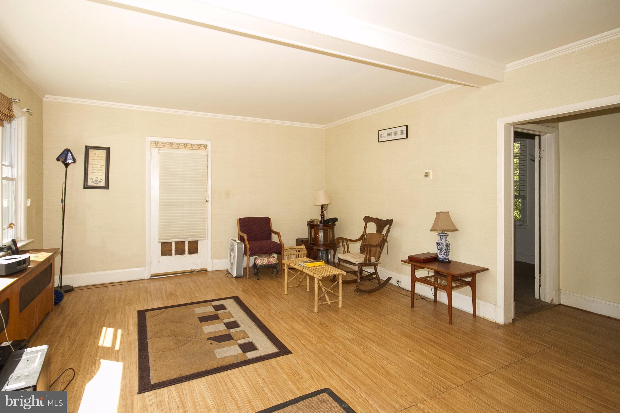 118 Byway Road Owings Mills, MD 21117 - Photo 8 of 25 a living room with furniture and a table