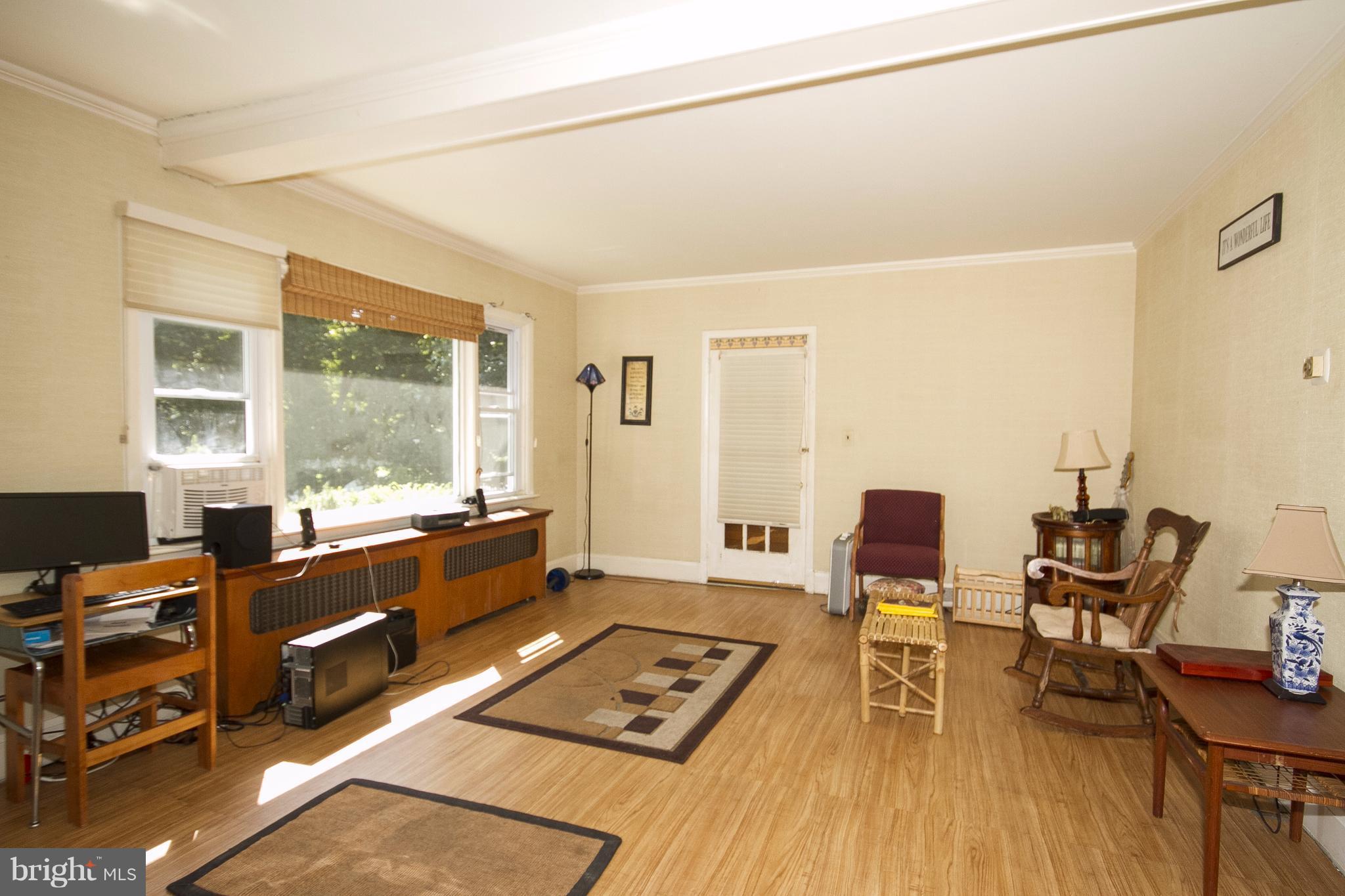 118 Byway Road Owings Mills, MD 21117 - Photo 9 of 25 a room with furniture and a window