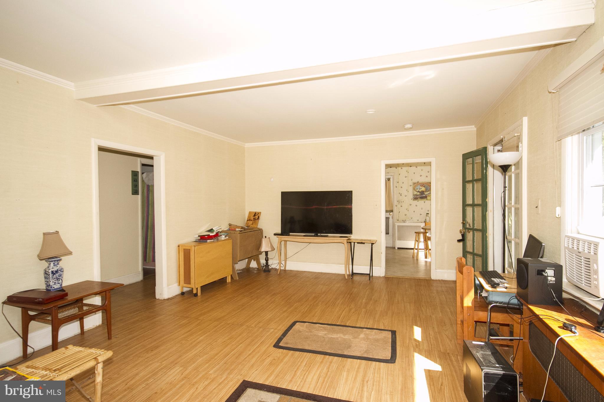 118 Byway Road Owings Mills, MD 21117 - Photo 10 of 25 a living room with furniture and a flat screen tv