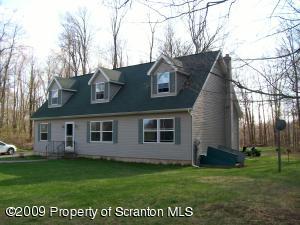 1765 Howe Road Moscow, PA 18444 - Photo 1 of 21 a view of a house with a yard