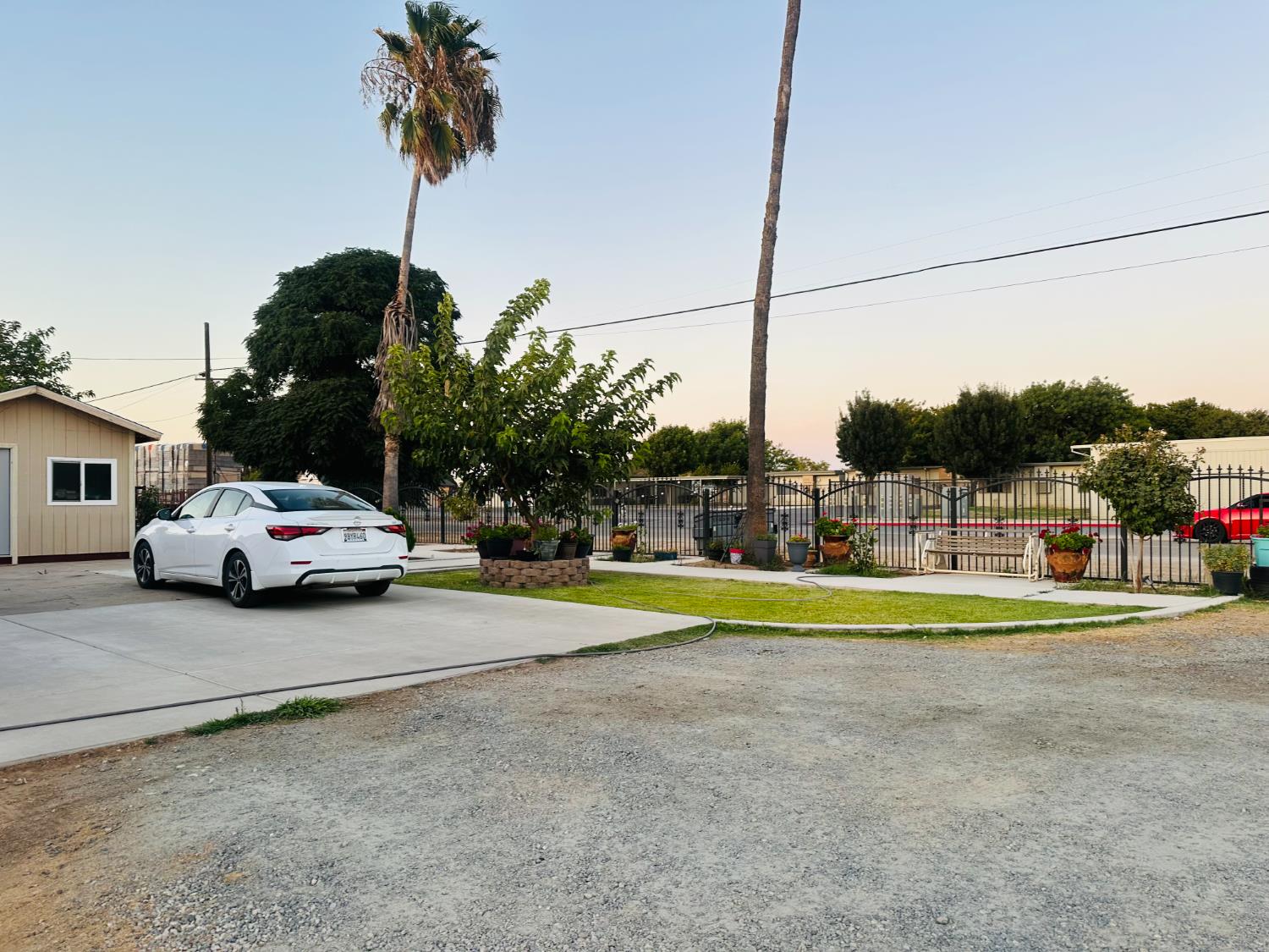 22788 Maple Street Chowchilla, CA 93610 - Photo 20 of 20 a view of a car parked in front of a house