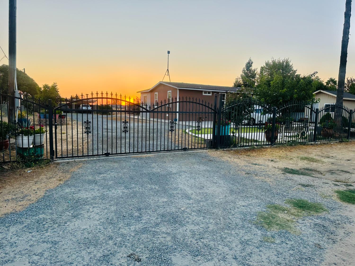 22788 Maple Street Chowchilla, CA 93610 - Photo 2 of 20 a view of a house with a yard
