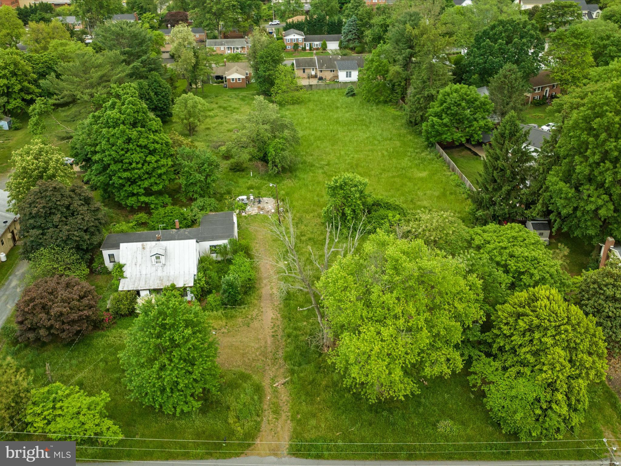 405 Old Waterford Road Northwest Leesburg, VA 20176 - Photo 13 of 14 a aerial view of a house with a yard