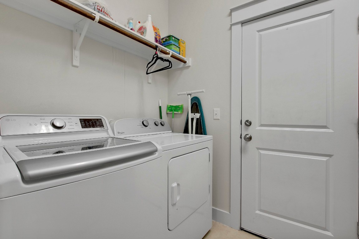 13001 Hymeadow Drive, Unit 39 Austin, TX 78729 - Photo 17 of 39 a utility room with dryer and washer