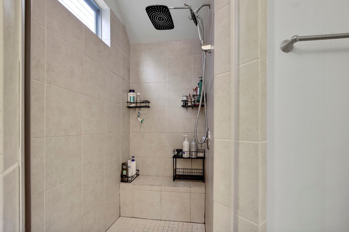 13001 Hymeadow Drive, Unit 39 Austin, TX 78729 - Photo 22 of 39 a bathroom with a shower