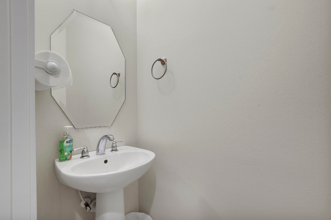 13001 Hymeadow Drive, Unit 39 Austin, TX 78729 - Photo 24 of 39 a bathroom with a sink and mirror