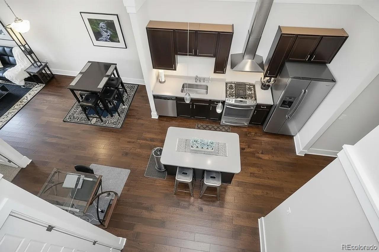 708 13th Street, Unit 250 Golden, CO 80401 - Photo 12 of 27 a living room with furniture and wooden floor
