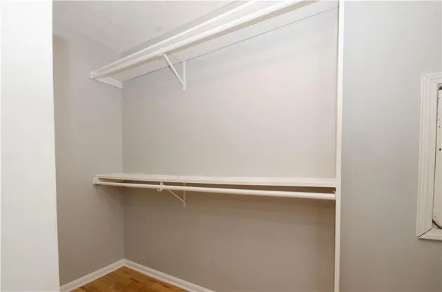 a bathroom with a shower and a sink