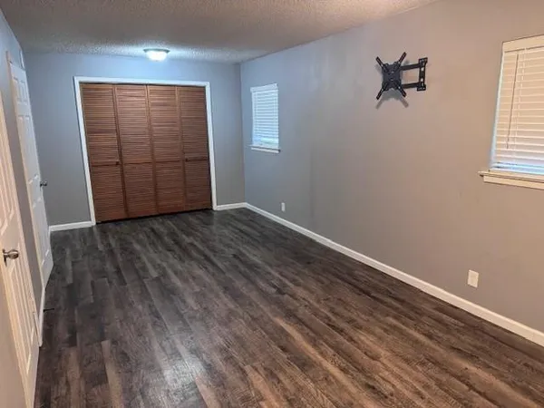 an empty room with windows