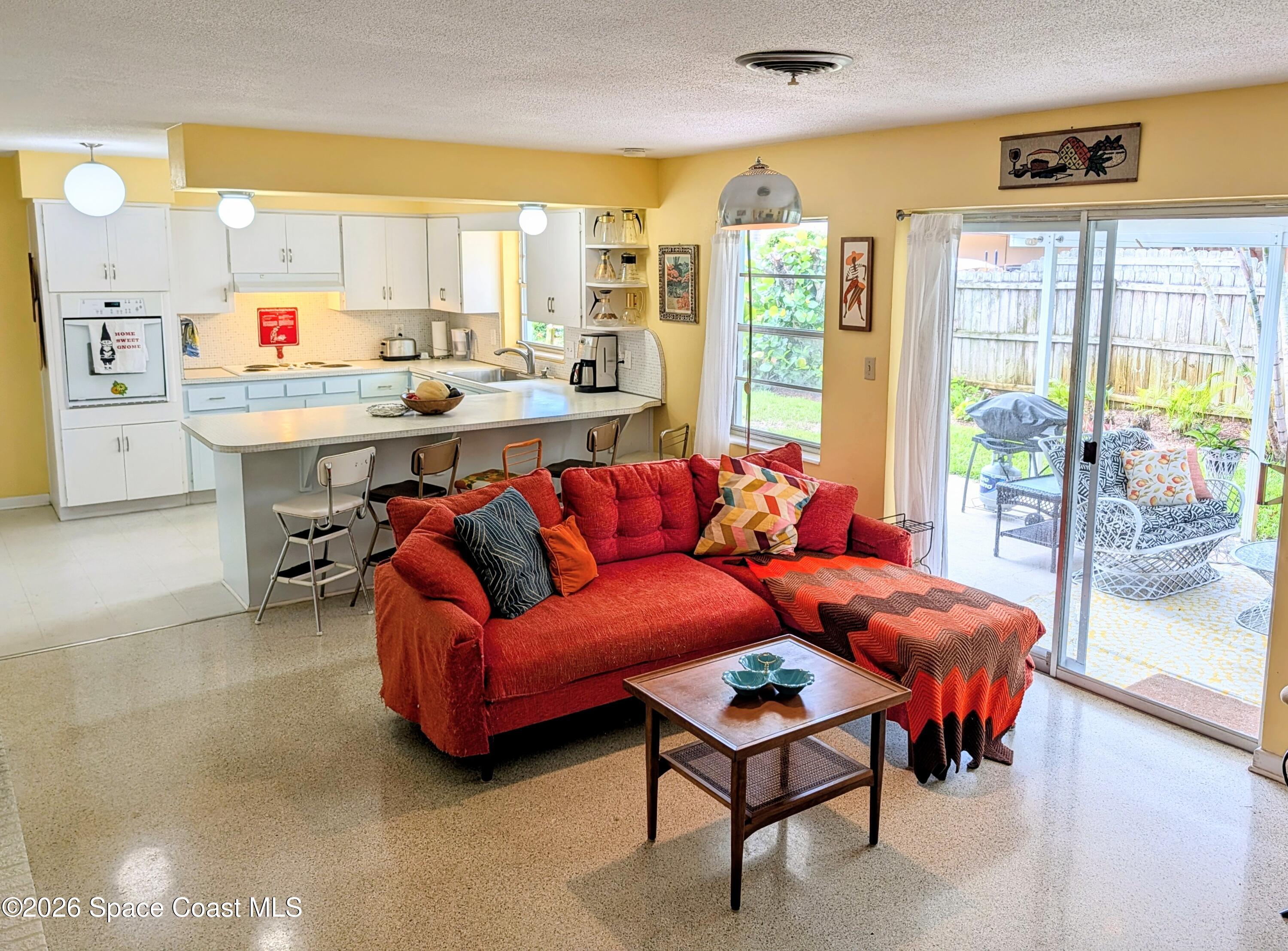 615 Oak Ridge Drive Indialantic, FL 32903 - Photo 17 of 65 Family Room & Kitchen