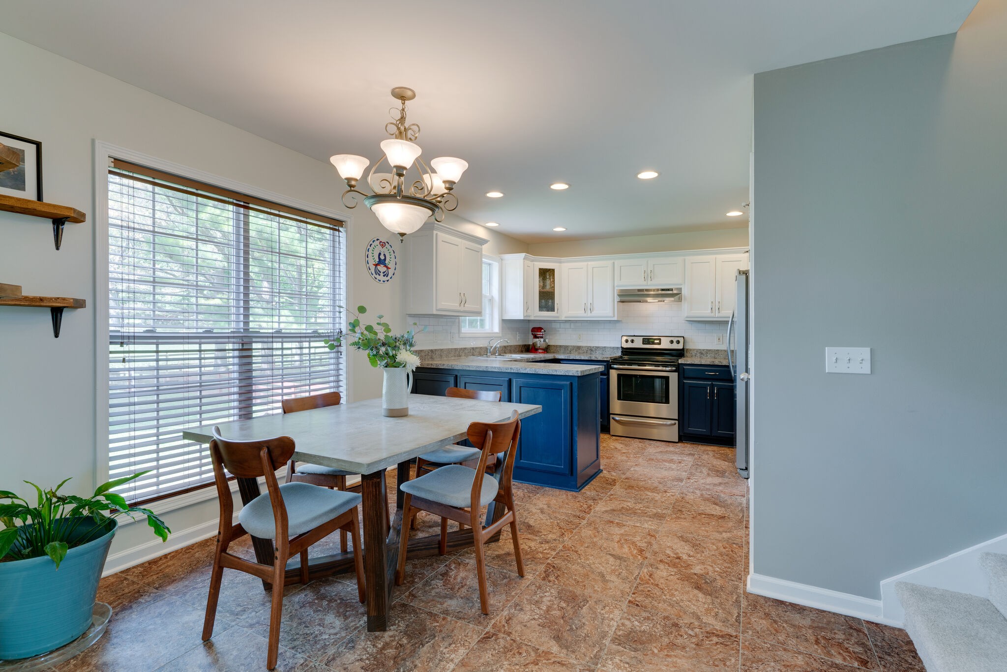 310 Lenox Court Springfield, TN 37172 - Photo 4 of 12 a view of a dining room with furniture and a chandelier