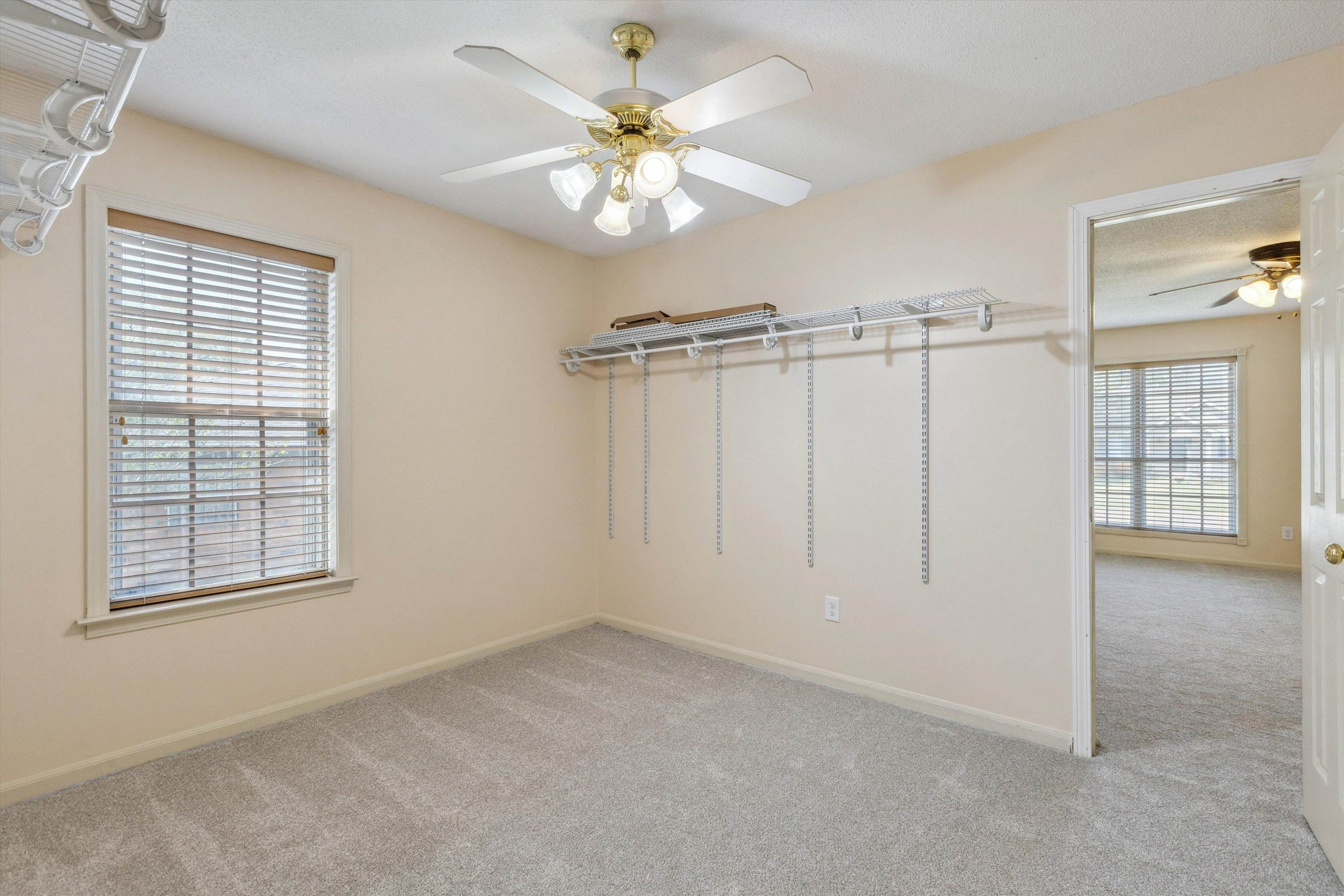 5747 Bartlett Woods Drive Bartlett, TN 38134 - Photo 23 of 28 Spacious closet featuring light carpet and ceiling fan