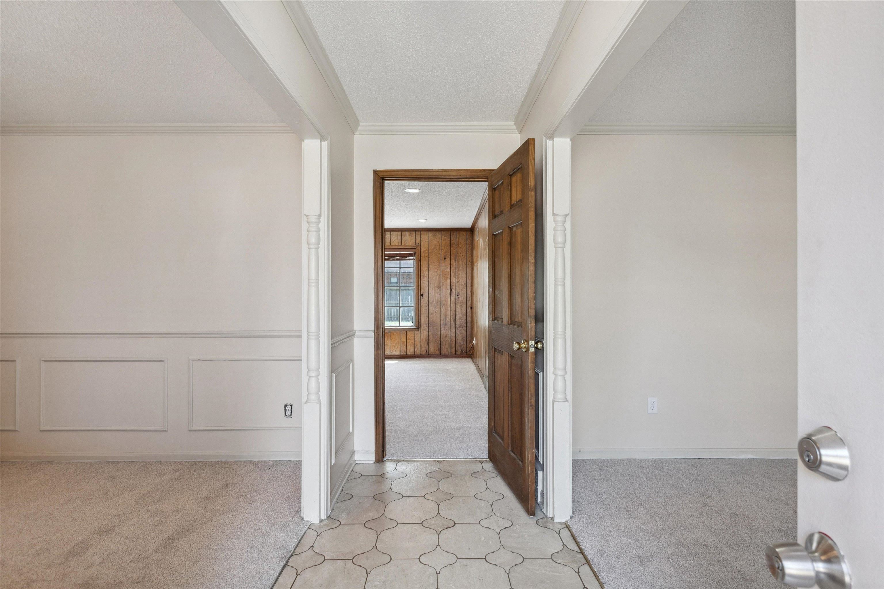 5747 Bartlett Woods Drive Bartlett, TN 38134 - Photo 6 of 28 Foyer entrance with light colored carpet and crown molding
