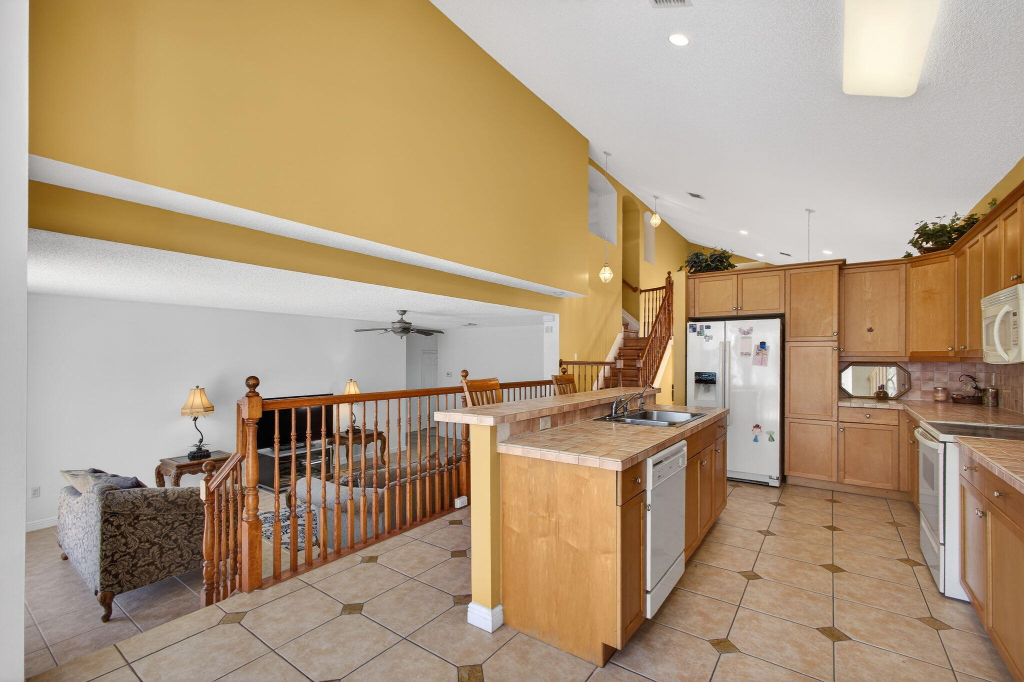 2008 Reston Circle Royal Palm Beach, FL 33411 - Photo 20 of 57 a kitchen that has a lot of cabinets in it
