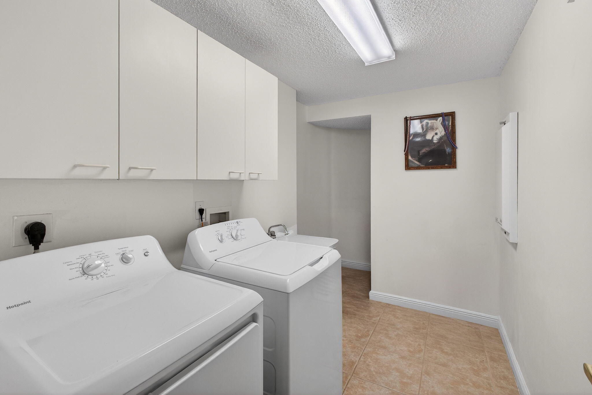 2008 Reston Circle Royal Palm Beach, FL 33411 - Photo 26 of 57 a utility room with dryer and washer