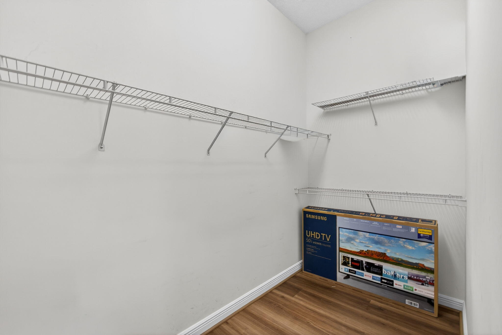 2008 Reston Circle Royal Palm Beach, FL 33411 - Photo 41 of 57 a view of a room with racks on the wall