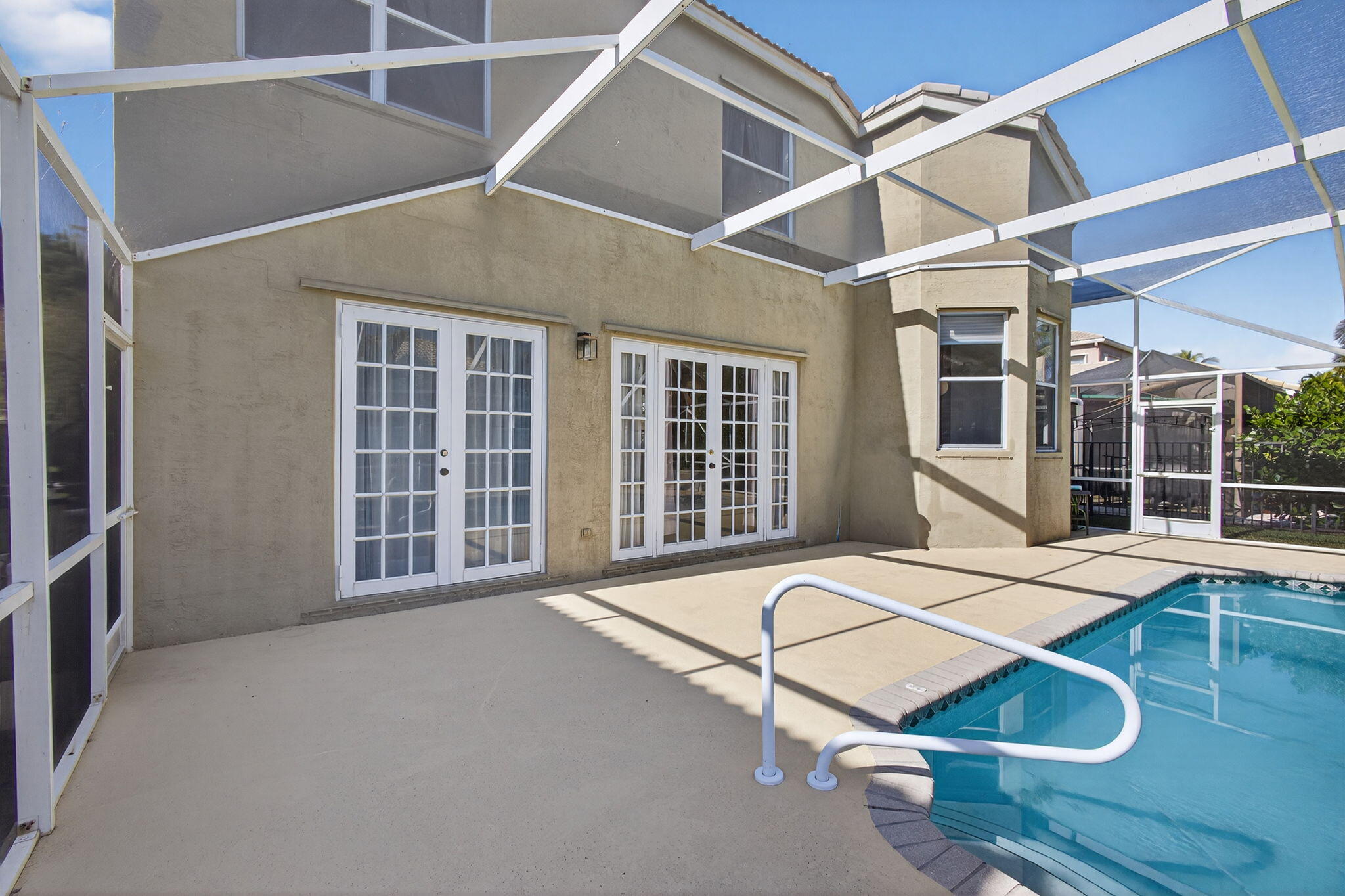 2008 Reston Circle Royal Palm Beach, FL 33411 - Photo 49 of 57 a building exterior with windows