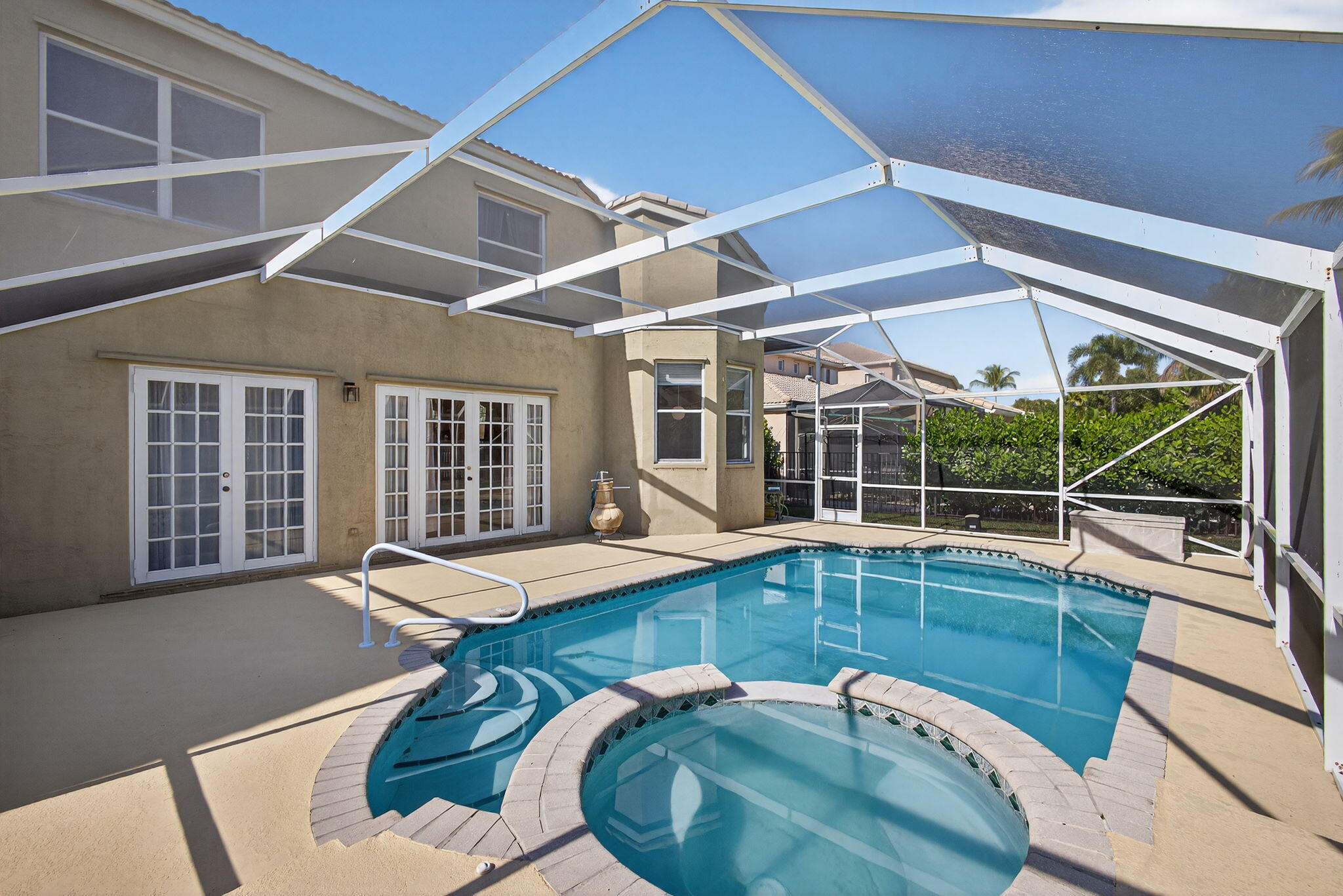 2008 Reston Circle Royal Palm Beach, FL 33411 - Photo 50 of 57 a swimming pool with outdoor seating and yard