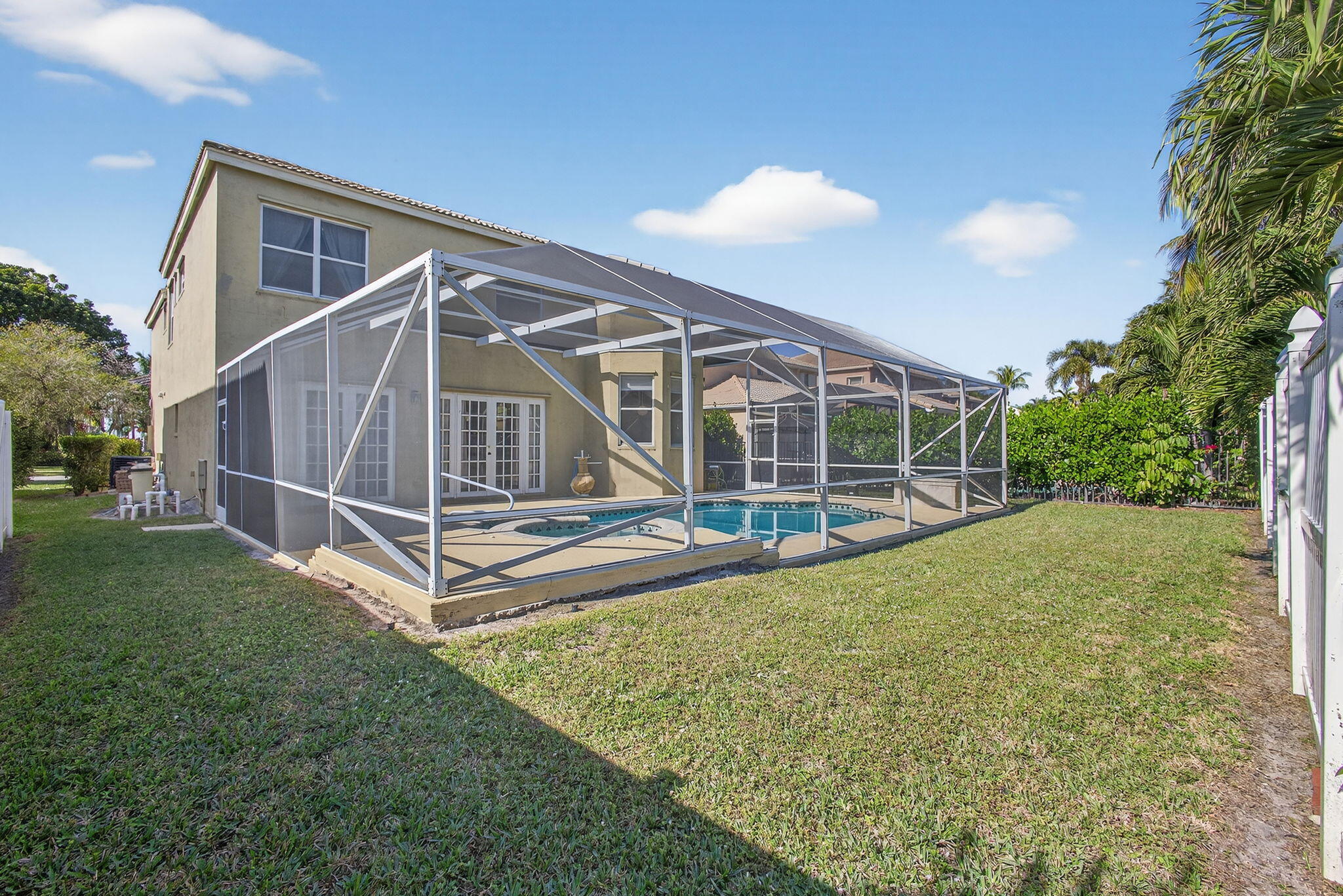 2008 Reston Circle Royal Palm Beach, FL 33411 - Photo 52 of 57 a view of a house with backyard and porch