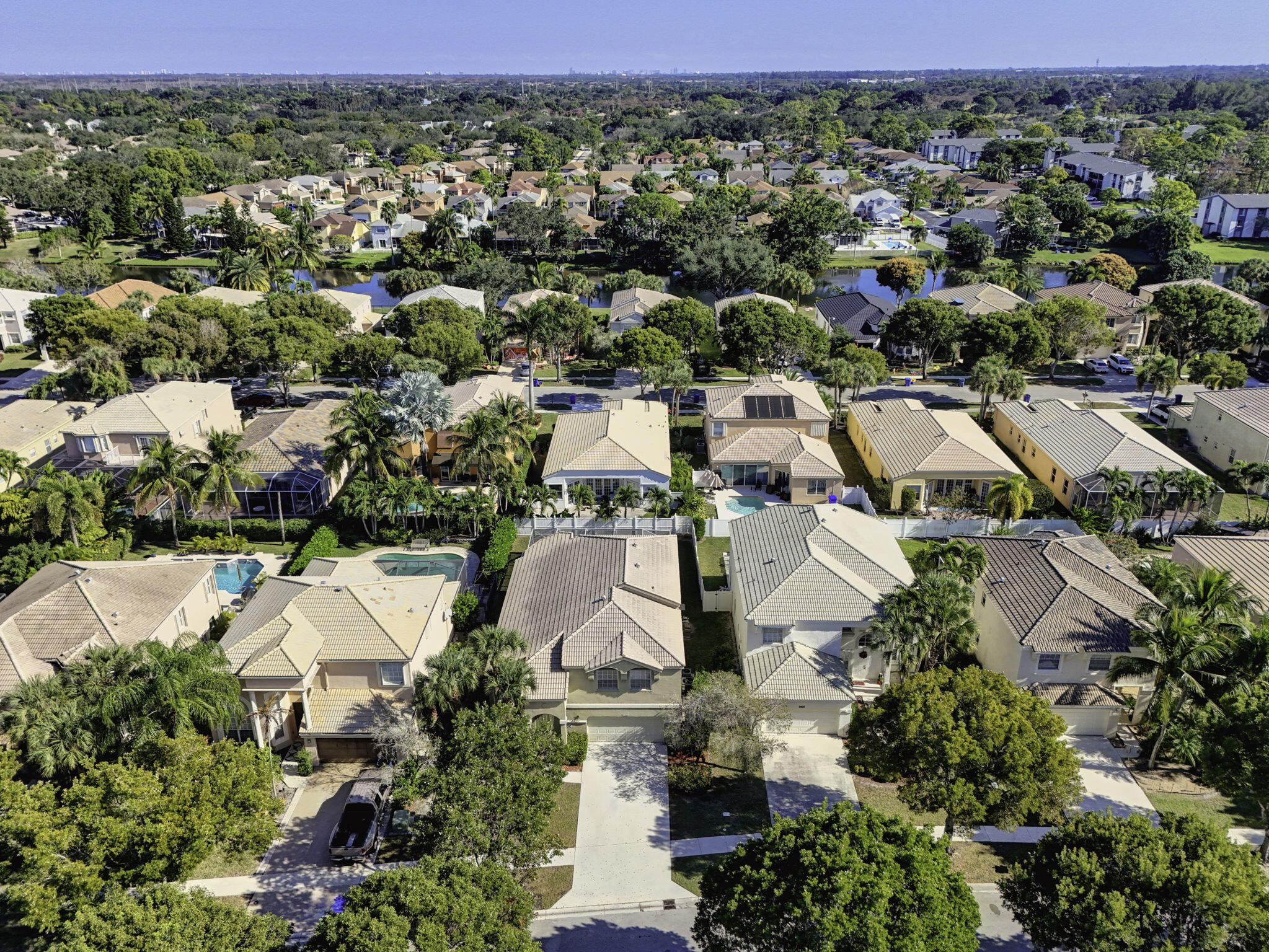 2008 Reston Circle Royal Palm Beach, FL 33411 - Photo 54 of 57 an aerial view of residential houses with outdoor space