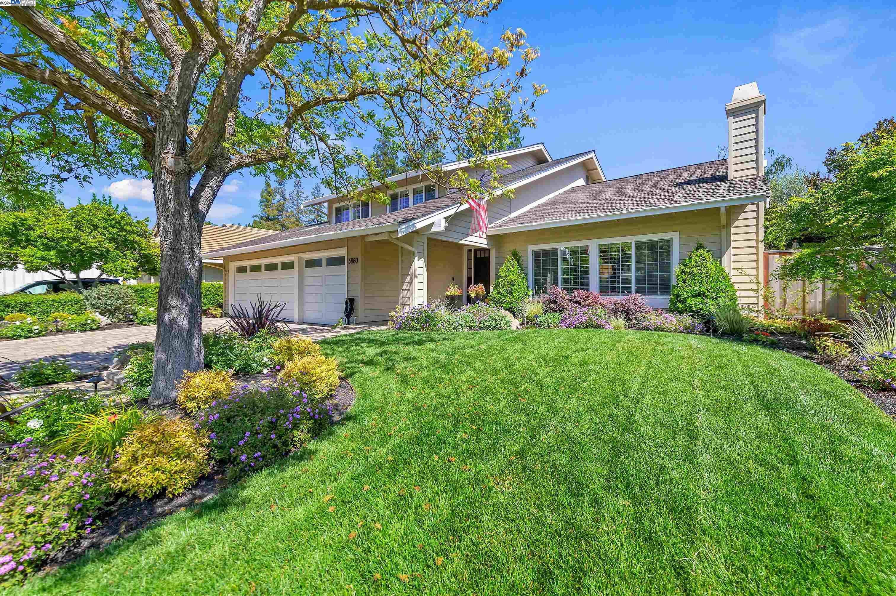 5860 Corte Mente Pleasanton, CA 94566 - Photo 1 of 1 a front view of a house with garden