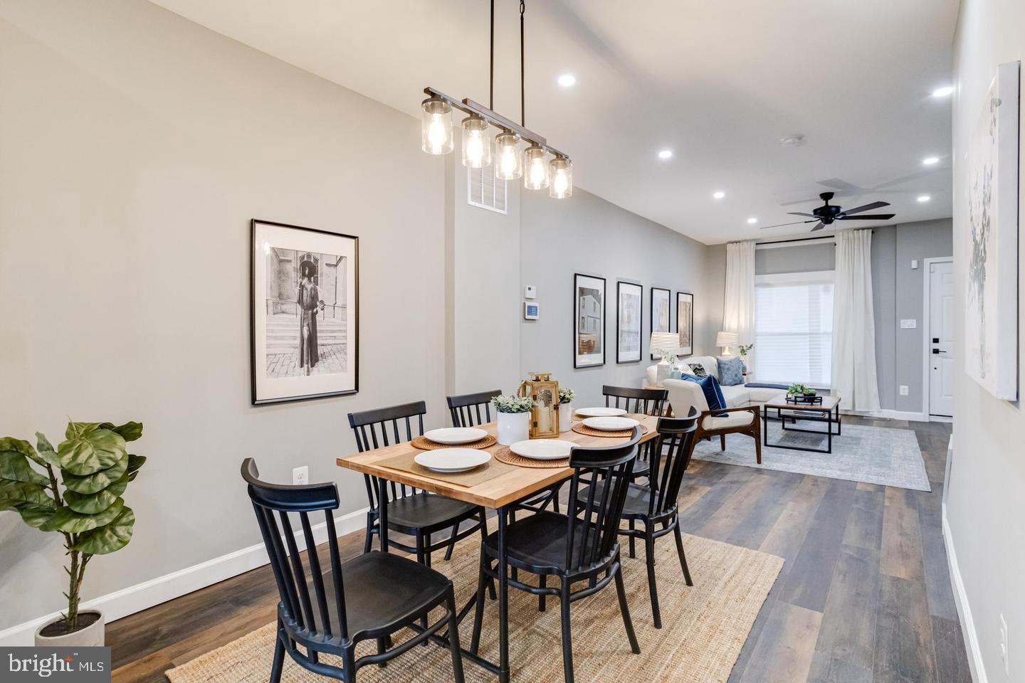 3011 Pulaski Highway Baltimore, MD 21224 - Photo 13 of 55 a view of a dining room with furniture and wooden floor