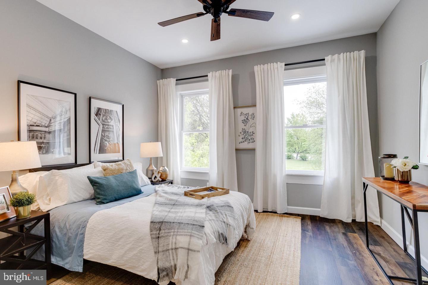 3011 Pulaski Highway Baltimore, MD 21224 - Photo 22 of 55 a bedroom with a bed and a window