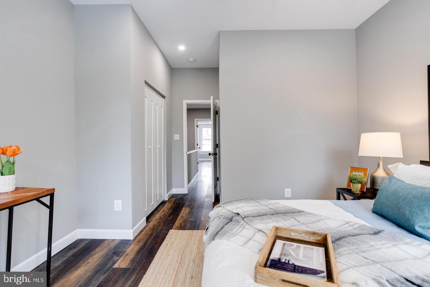 3011 Pulaski Highway Baltimore, MD 21224 - Photo 26 of 55 a bed room with a bed and a lamp