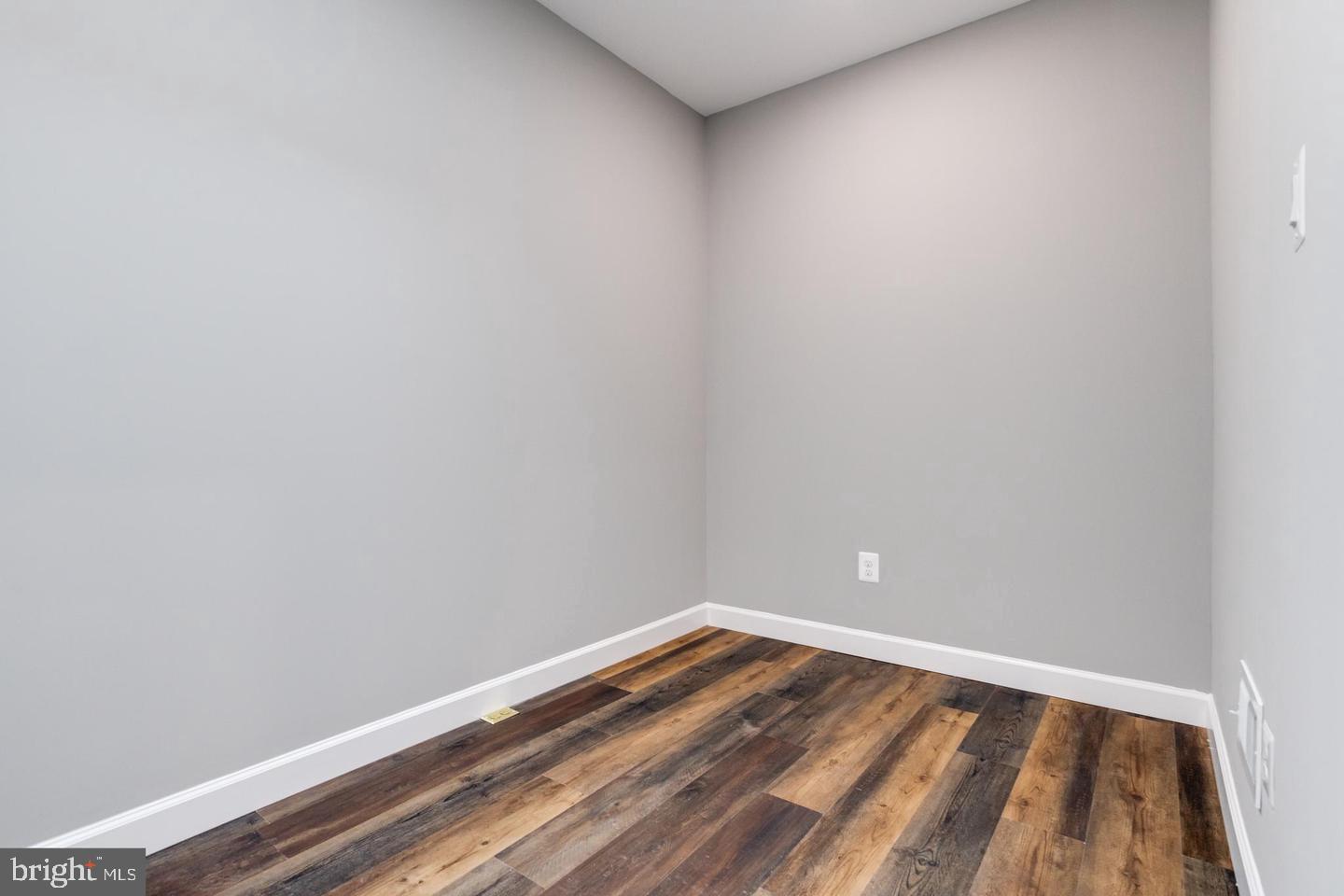 3011 Pulaski Highway Baltimore, MD 21224 - Photo 37 of 55 a view of a room with wooden floor