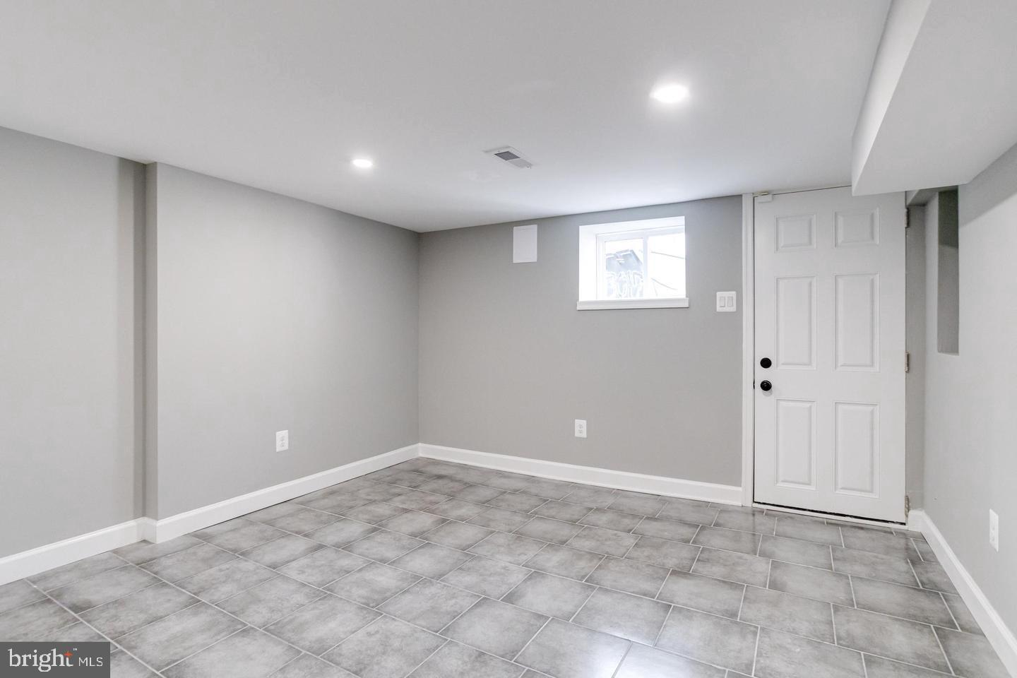 3011 Pulaski Highway Baltimore, MD 21224 - Photo 43 of 55 a view of an empty room with a window