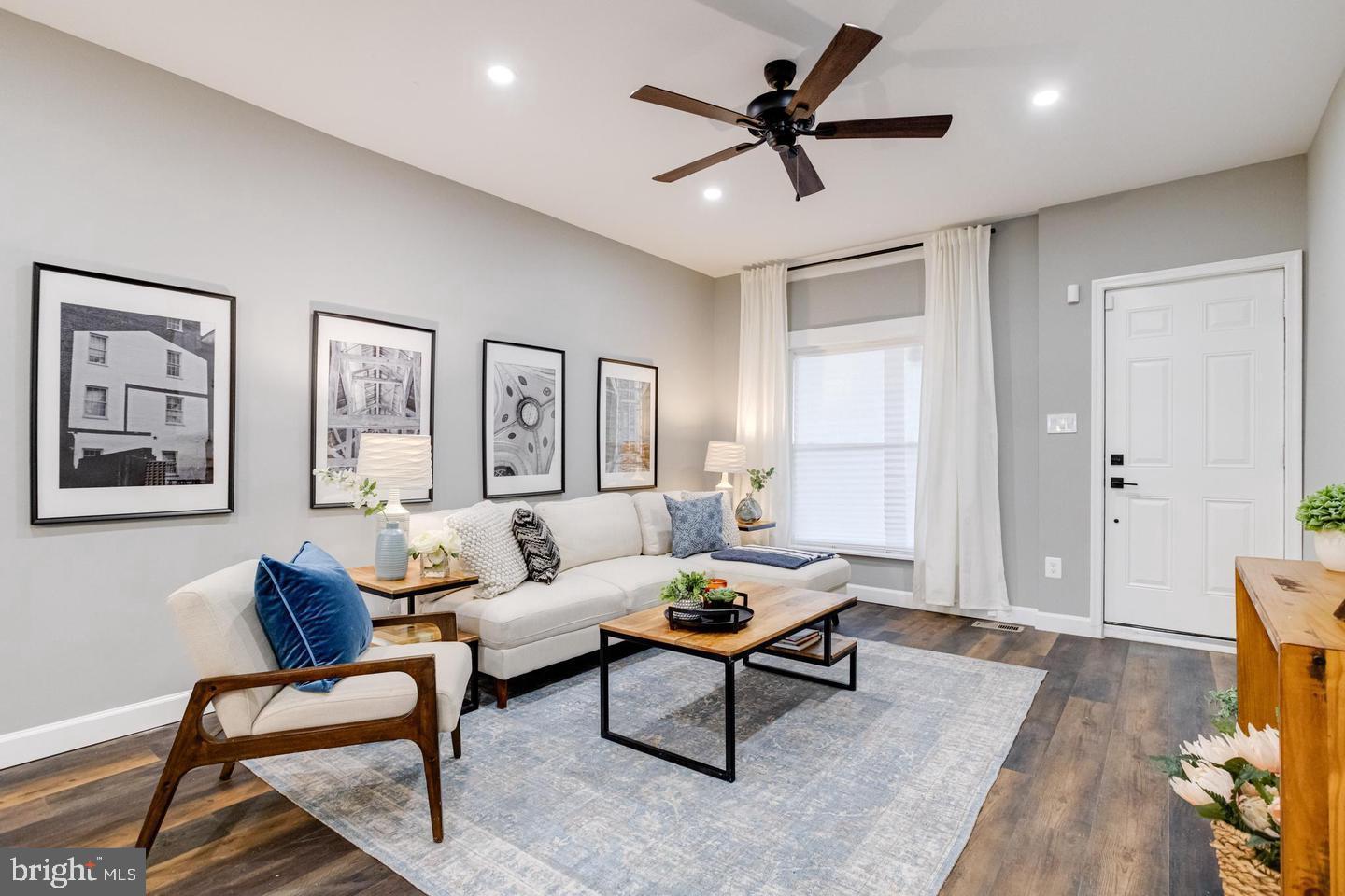 3011 Pulaski Highway Baltimore, MD 21224 - Photo 7 of 55 a living room with furniture and a wooden floor