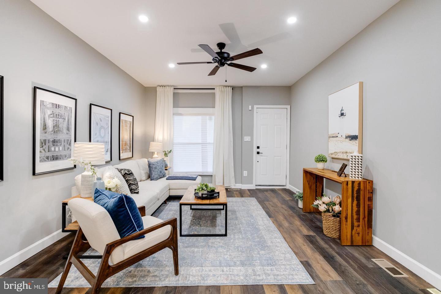 3011 Pulaski Highway Baltimore, MD 21224 - Photo 8 of 55 a living room with furniture and a wooden floor