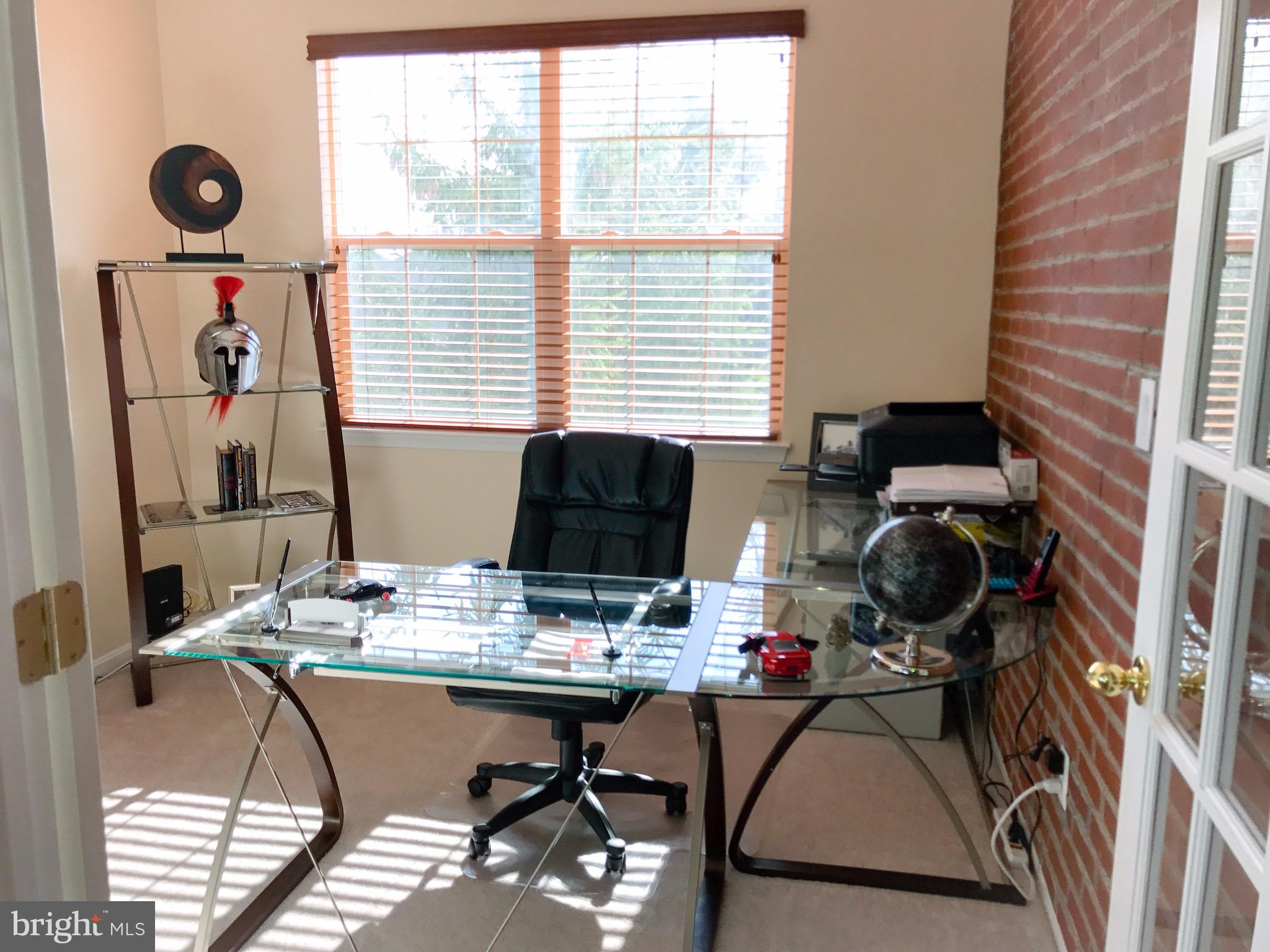 41 Hawk Rise Lane, Unit 202 Owings Mills, MD 21117 - Photo 18 of 33 a view of a workspace with furniture and a window