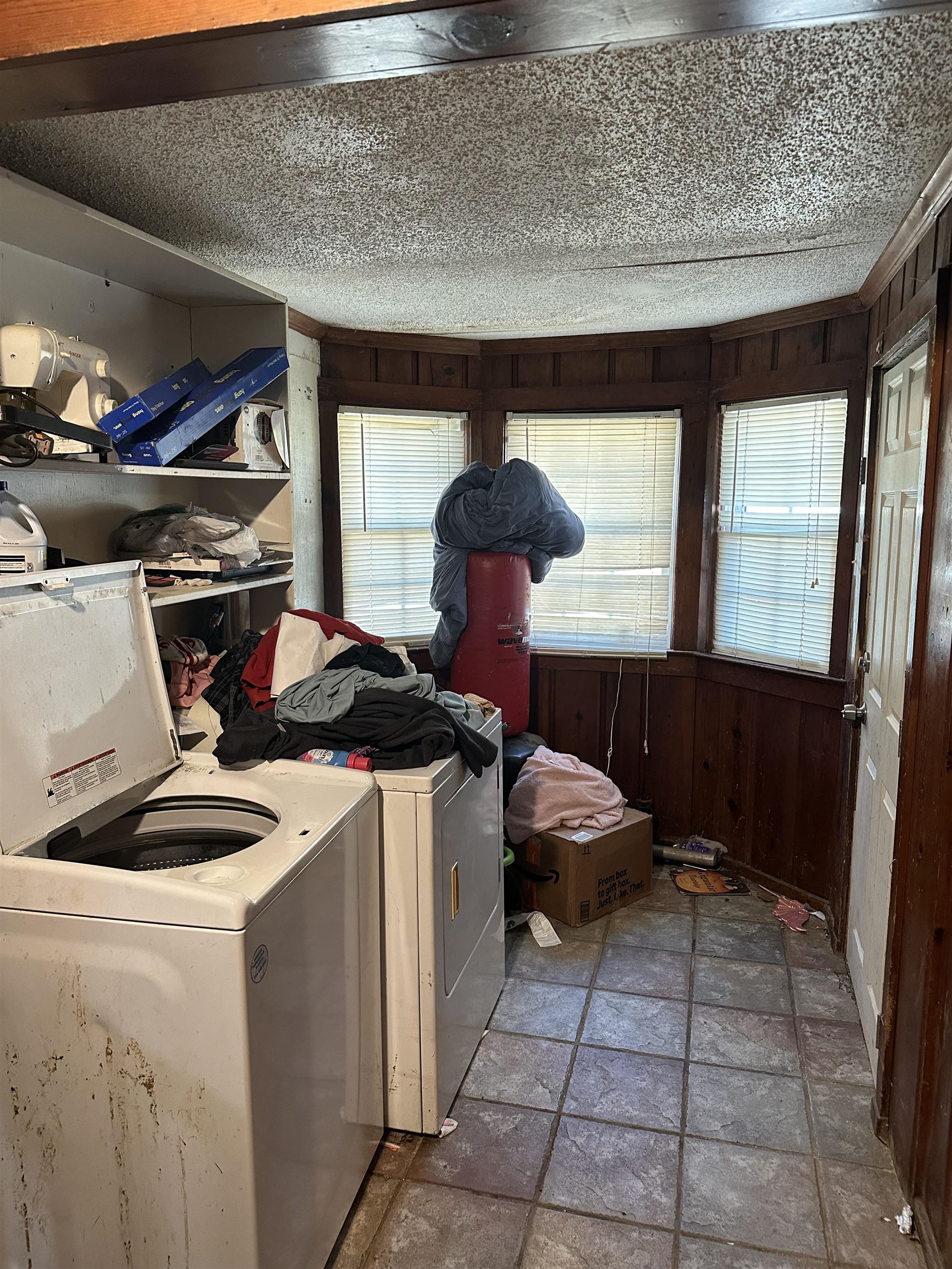 903 Mosby Road Memphis, TN 38116 - Photo 6 of 9 a room with storage and utility