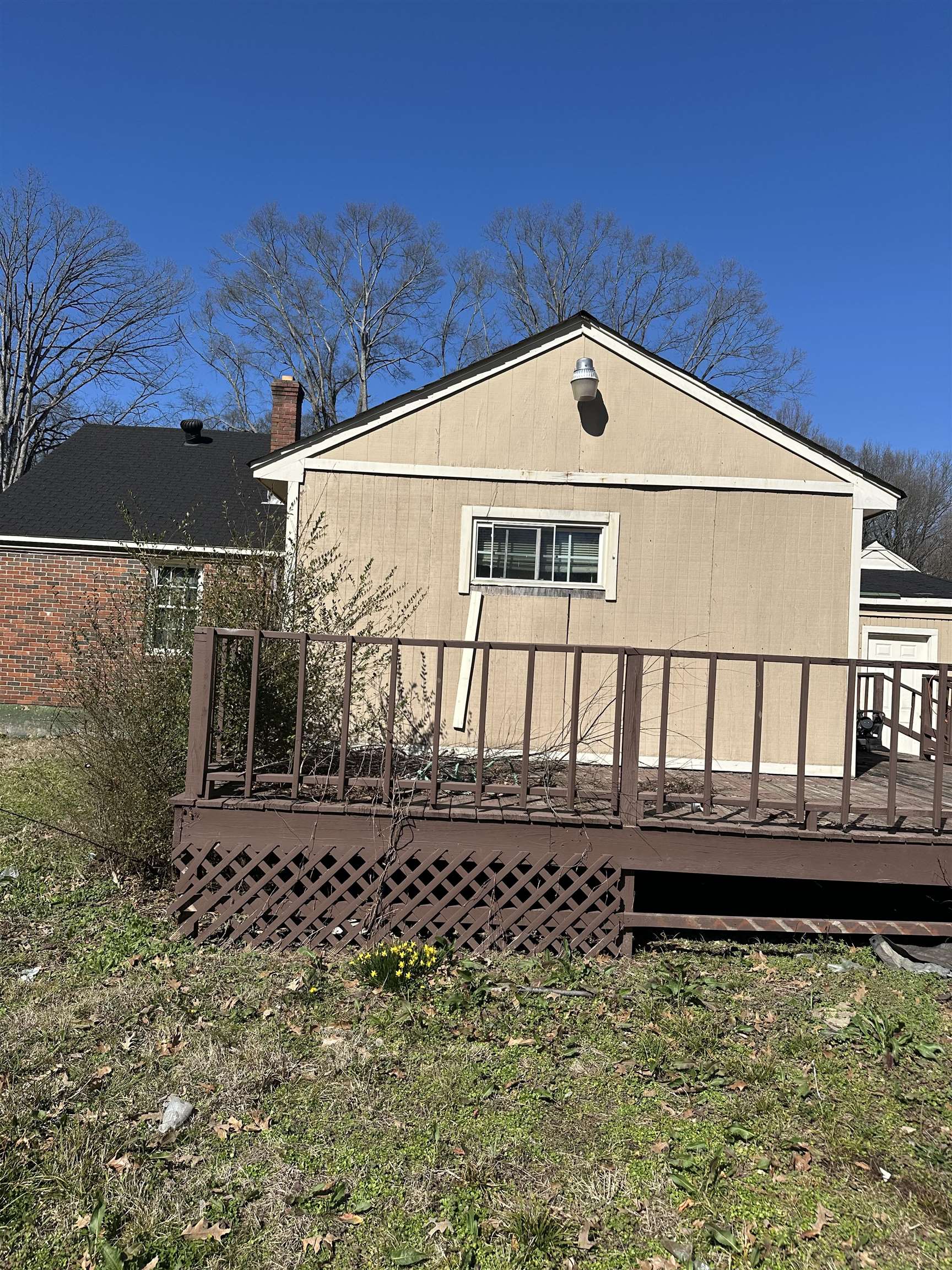 903 Mosby Road Memphis, TN 38116 - Photo 8 of 9 a front view of a house with a yard