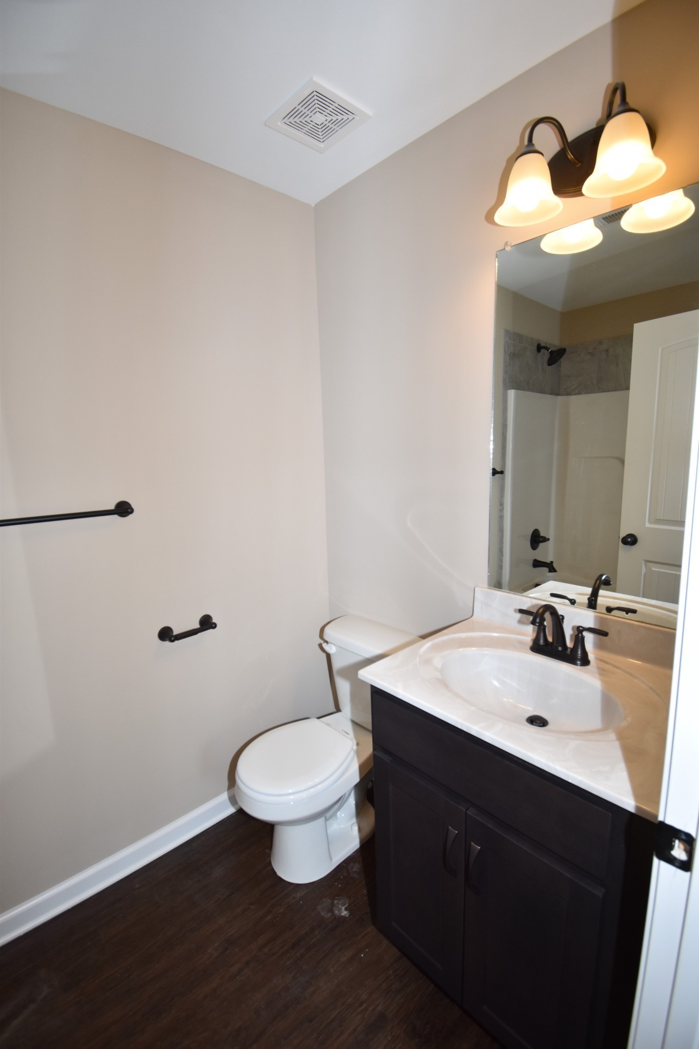 255 Smithson Lane, Unit B Clarksville, TN 37040 - Photo 13 of 21 a bathroom with a sink and a mirror