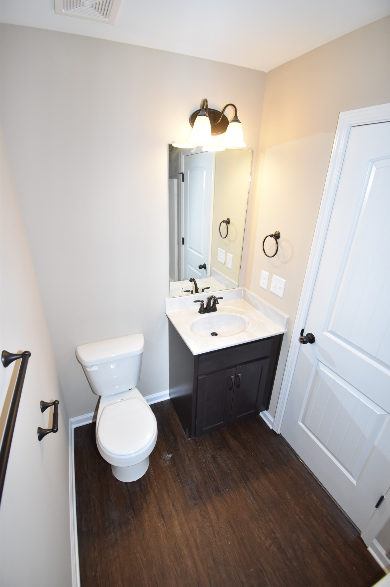 255 Smithson Lane, Unit B Clarksville, TN 37040 - Photo 15 of 21 a bathroom with a sink toilet and mirror