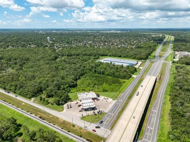 a view of a balcony with an outdoor seating