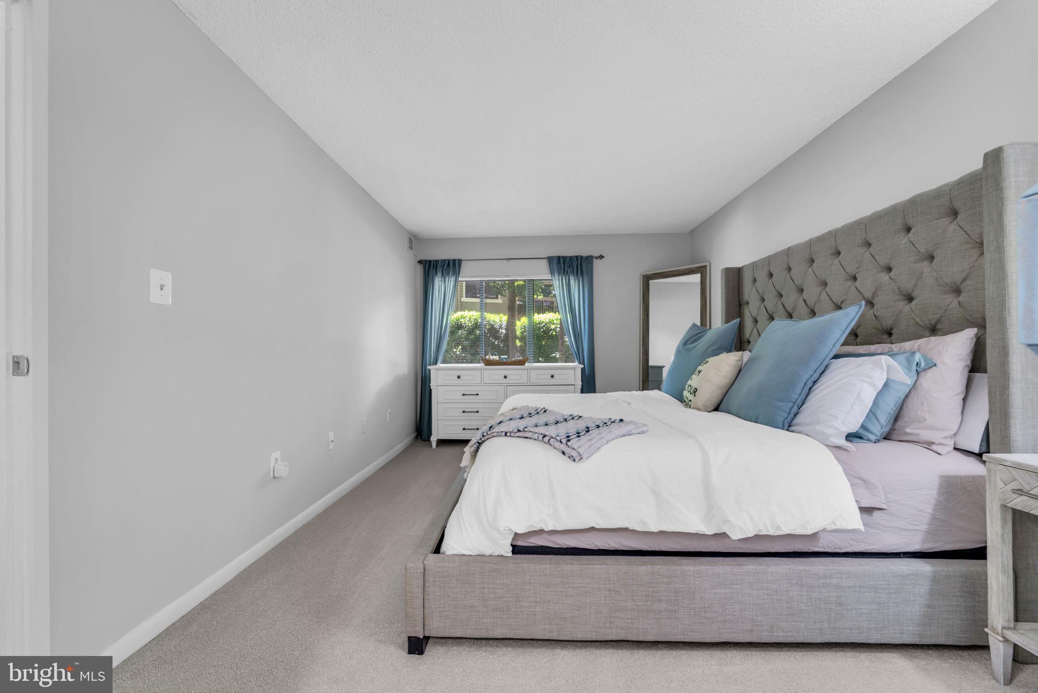 11743 Ledura Court, Unit 104 Reston, VA 20191 - Photo 20 of 38 Master Bedroom