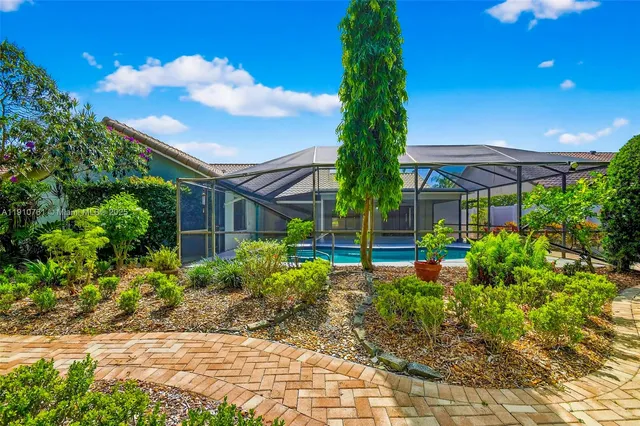 a bathroom with a toilet a sink and a mirror