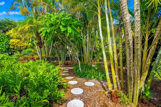 a bedroom with a bed and a chair