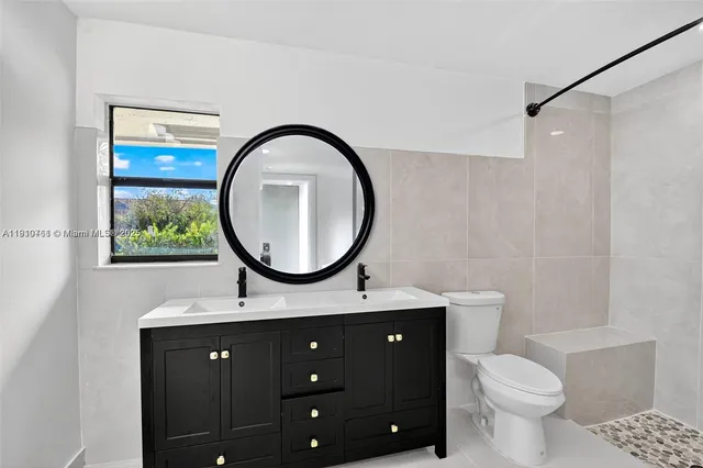 a view of a house with a swimming pool and a yard