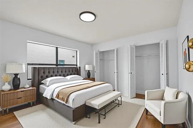 an aerial view of a house with a big yard