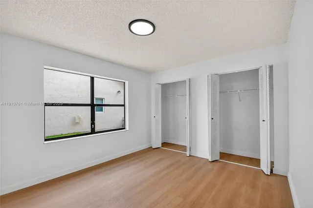 an aerial view of a house with a swimming pool yard and outdoor seating