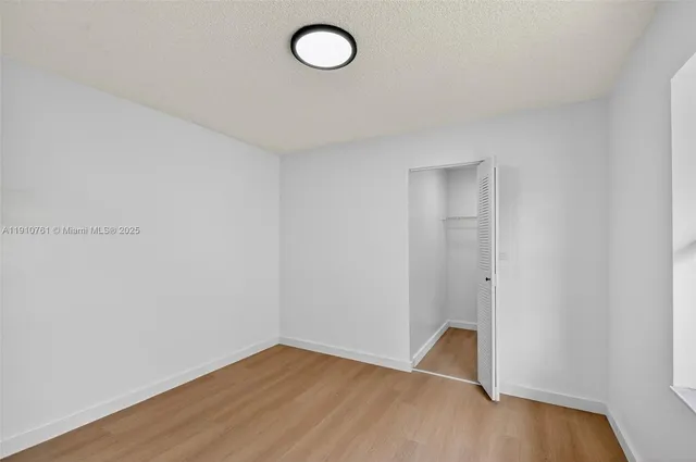 a sign on the side of the house