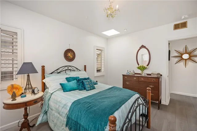 a patio with patio a table and chairs under an umbrella