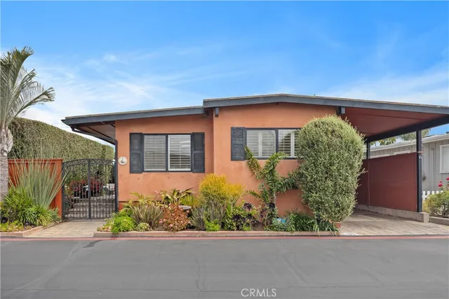 front view of a house with a street