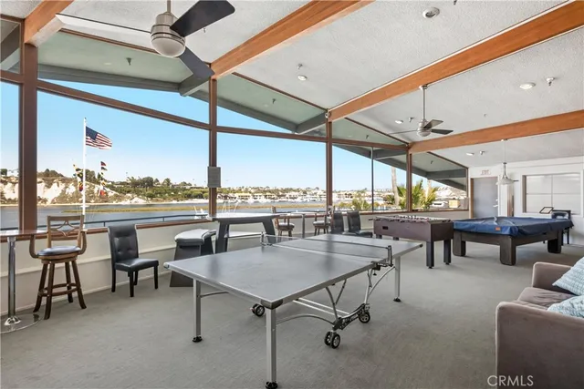 a view of a lake with houses in the back