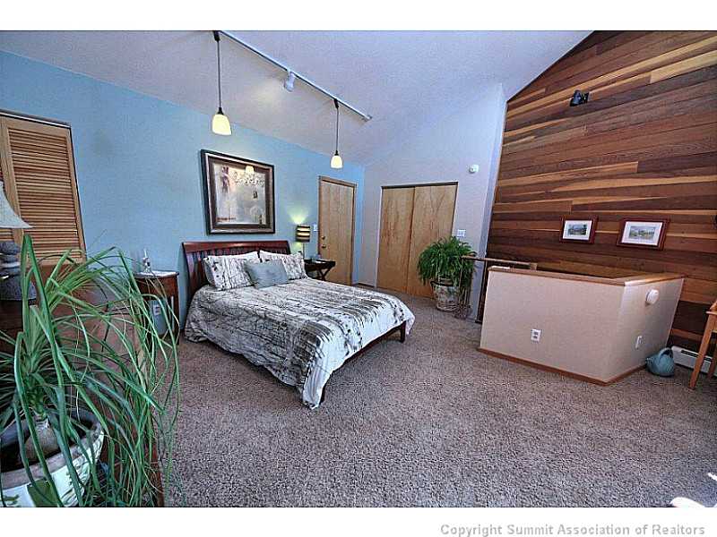 9460 Ryan Gulch Road, Unit 485 Silverthorne, CO 80498 - Photo 14 of 23 Master Bedroom.