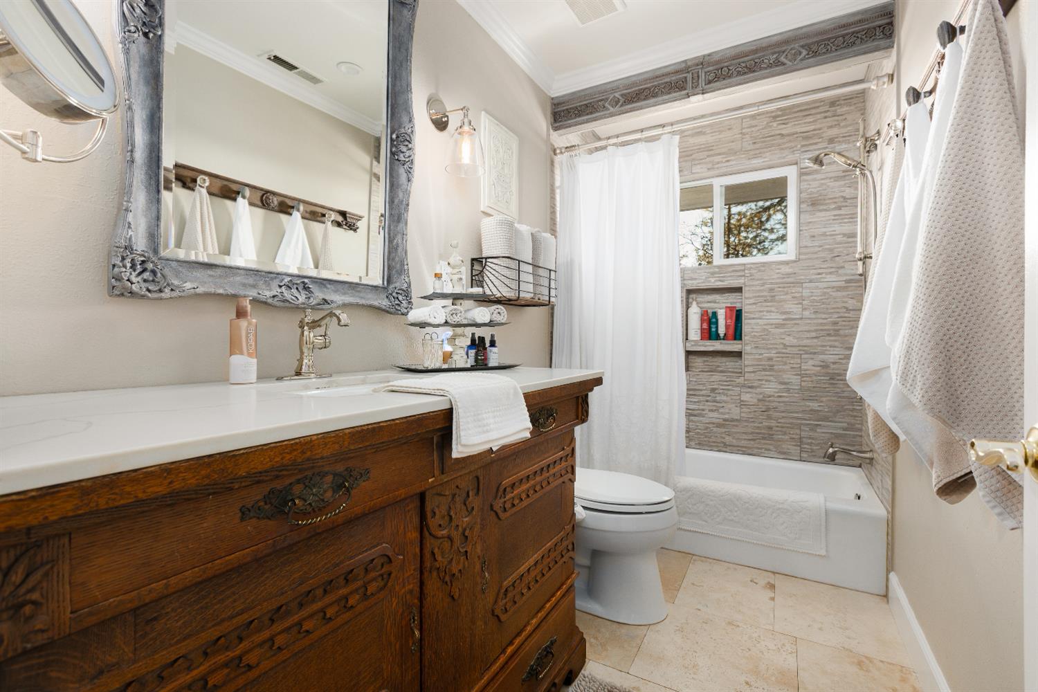 12636 Nottingham Lane Grass Valley, CA 95949 - Photo 16 of 34 a bathroom with a granite countertop sink a toilet a mirror and shower